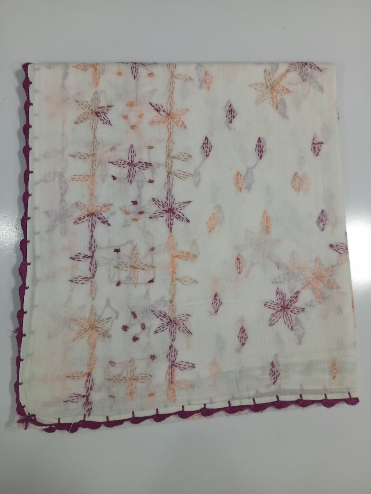Floral patterned fabric with a white background