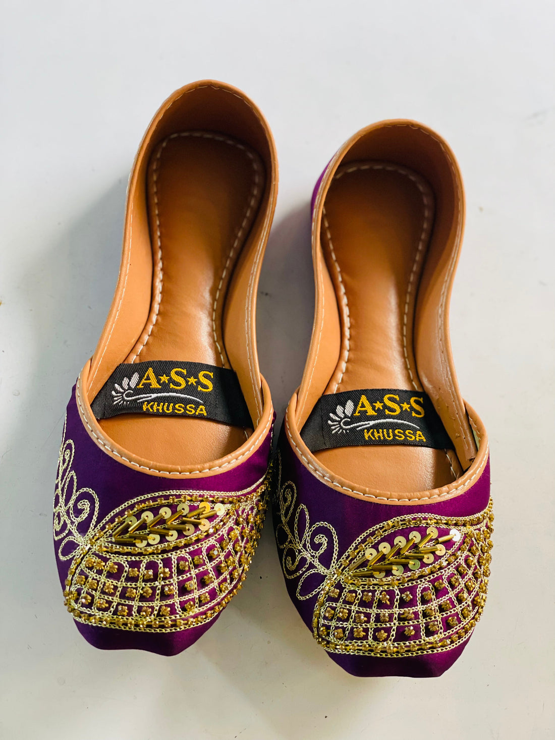 Multani Khussa wd Handmade tilla work available in purple nd black